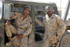 AL ASAD, Iraq –Seaman Albert Hendrick Jr. (left) and Petty Officer 2nd Class Sean Hurley, both with Surgical Company, Combat Logistics Battalion 2, 2d Force Service Support Group (Forward), discovered they are brothers two days before they deployed to Iraq together. (Photo by Cpl. John E. Lawson Jr.)
